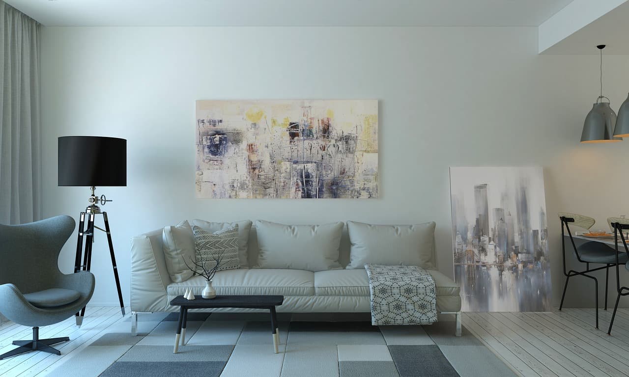 Pale grey living room with fresh white walls